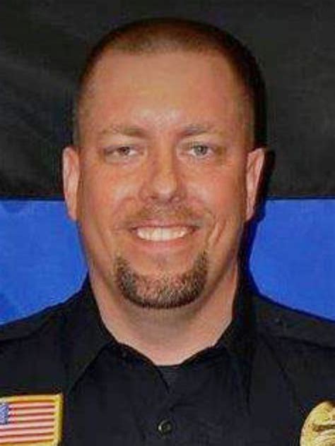 Officer who killed mall attack shooter hailed as a hero
